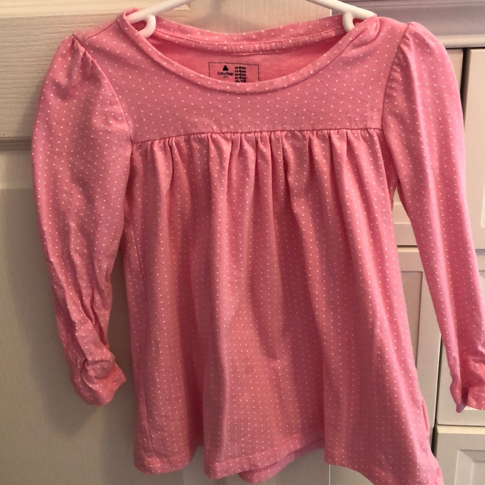 Pink top with white polka dots
